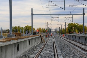 Rail line under construction at 61st Avenue and the Peña Blvd. station near DIA. The station will act as the rail hub for planned mixed-use development coming to the area. Photo: Denver International Airport 